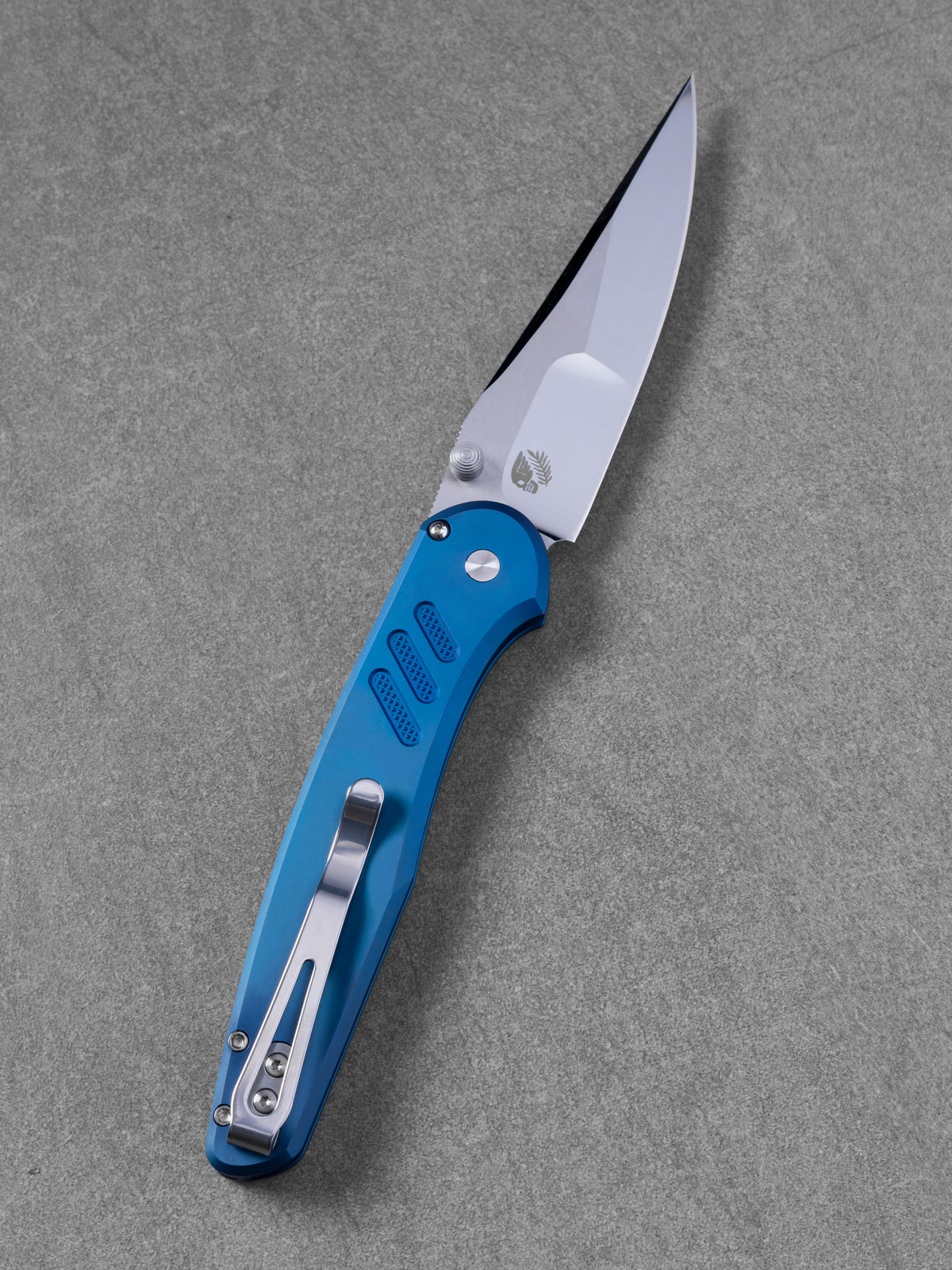 Pro-Tech Avalon – Peace Neighbor Design, Sapphire Blue PVD Knurled 17-4 Stainless Steel Handle, Mike Irie Compound Mirror Polished 154CM Blade