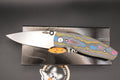 TRM-Three Rivers Manufacturing Neutron 2 80s Camo Contoured Carbon Fiber Scales Liner Lock Magnacut Steel Blade