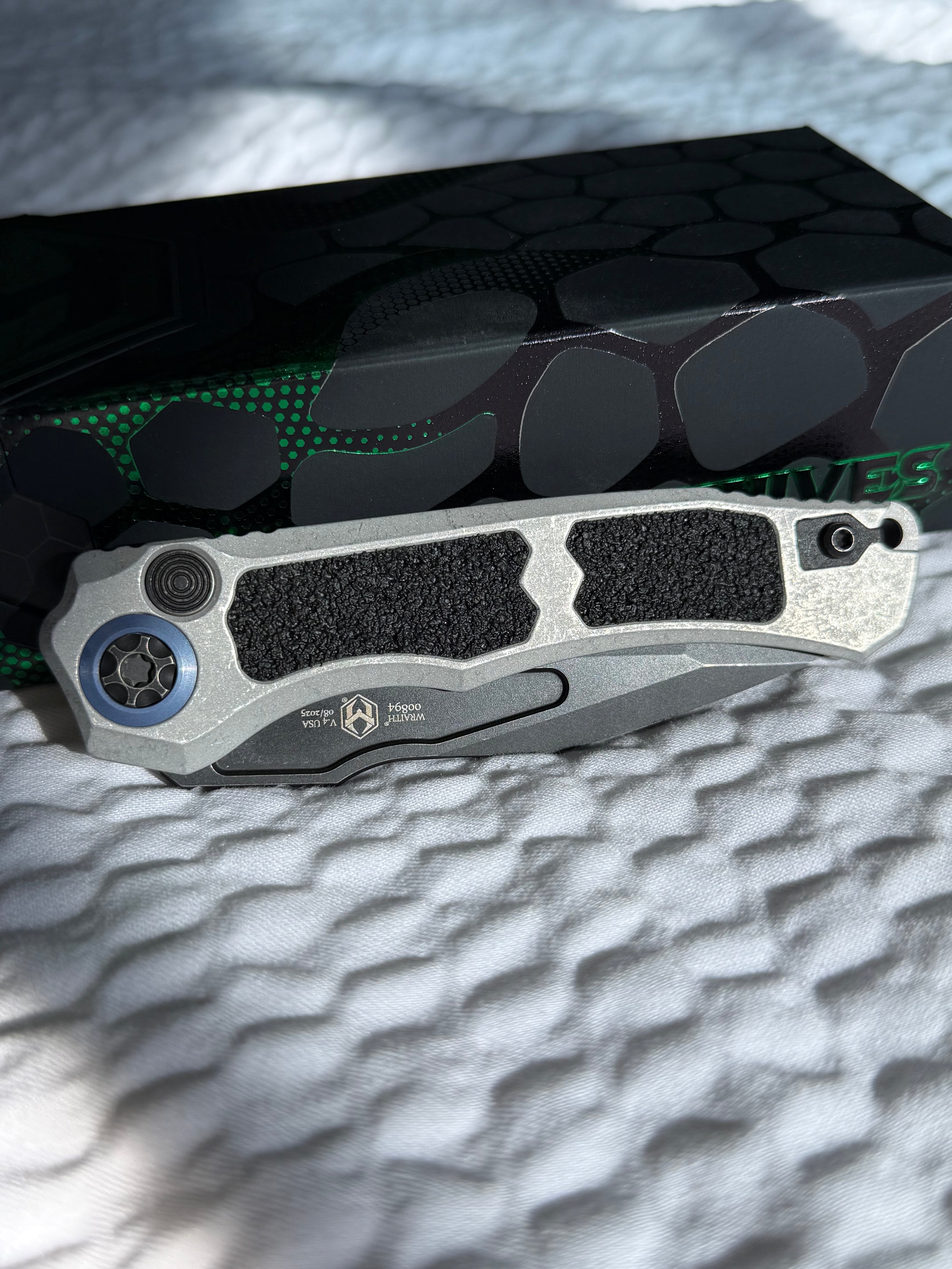 Heretic Knives Automatic Wraith V4 Battleworn Black Tanto Magnacut blade Blizzard Chassis w/ Blue Ti Collar
