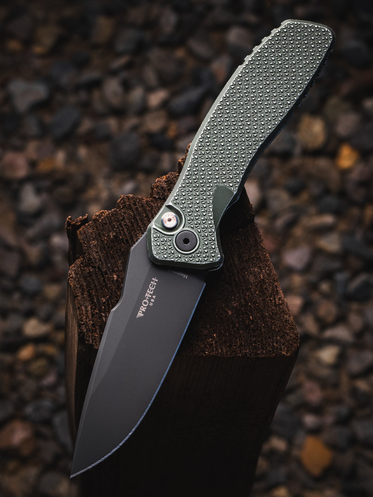Spartan Blades and Pro-Tech Collaboration Pallas Carbide Texture Green Battleworn Aluminum handle DLC Magnacut Blade with Mosaic Button. Serialized out of 60