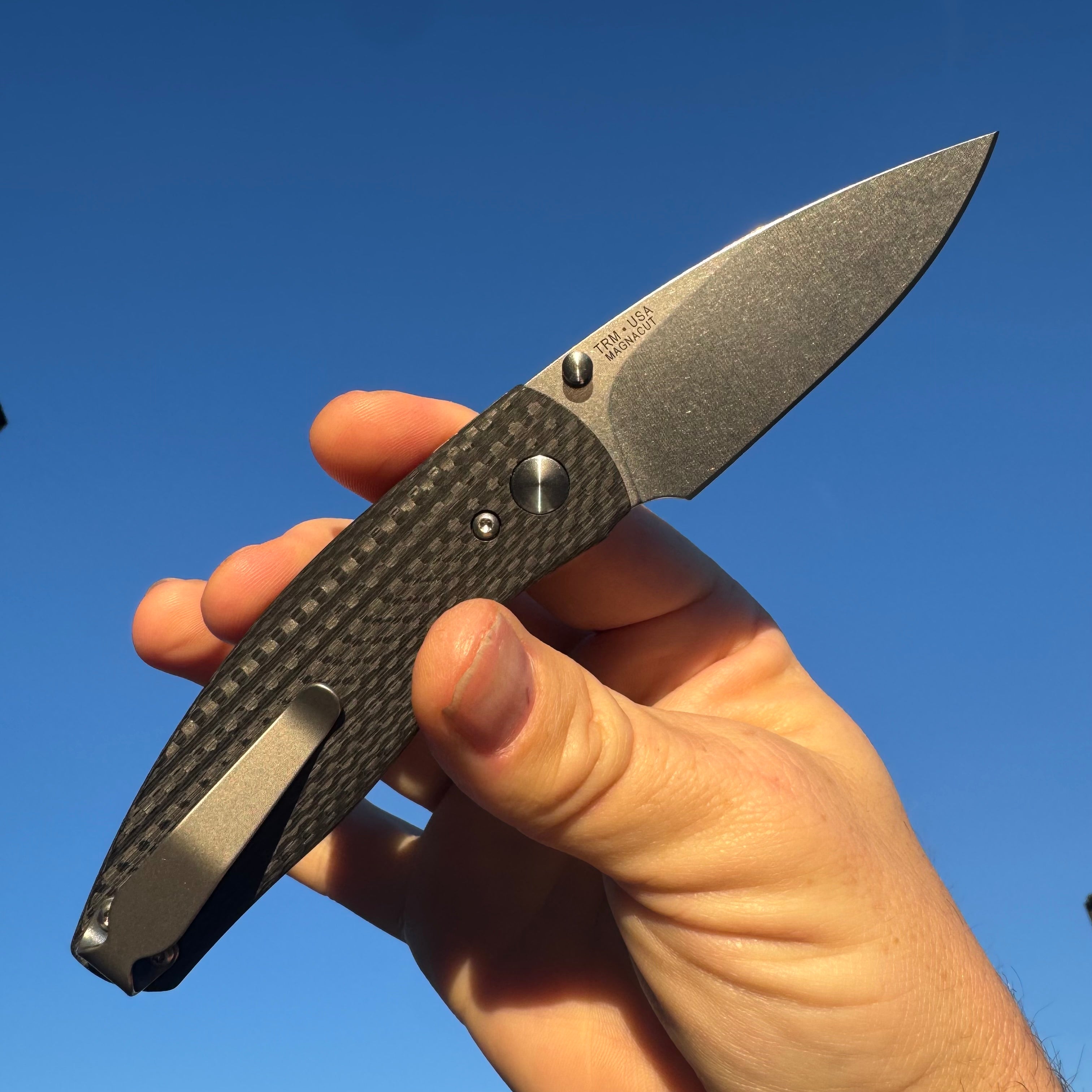 TRM-Three Rivers Manufacturing Neutron 2 Contoured Carbon Fiber Scales Liner Lock Magnacut Steel Blade