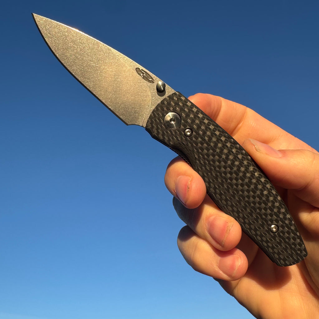 TRM-Three Rivers Manufacturing Neutron 2 Contoured Carbon Fiber Scales Liner Lock Magnacut Steel Blade